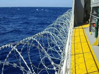 Cargo ship razor wire